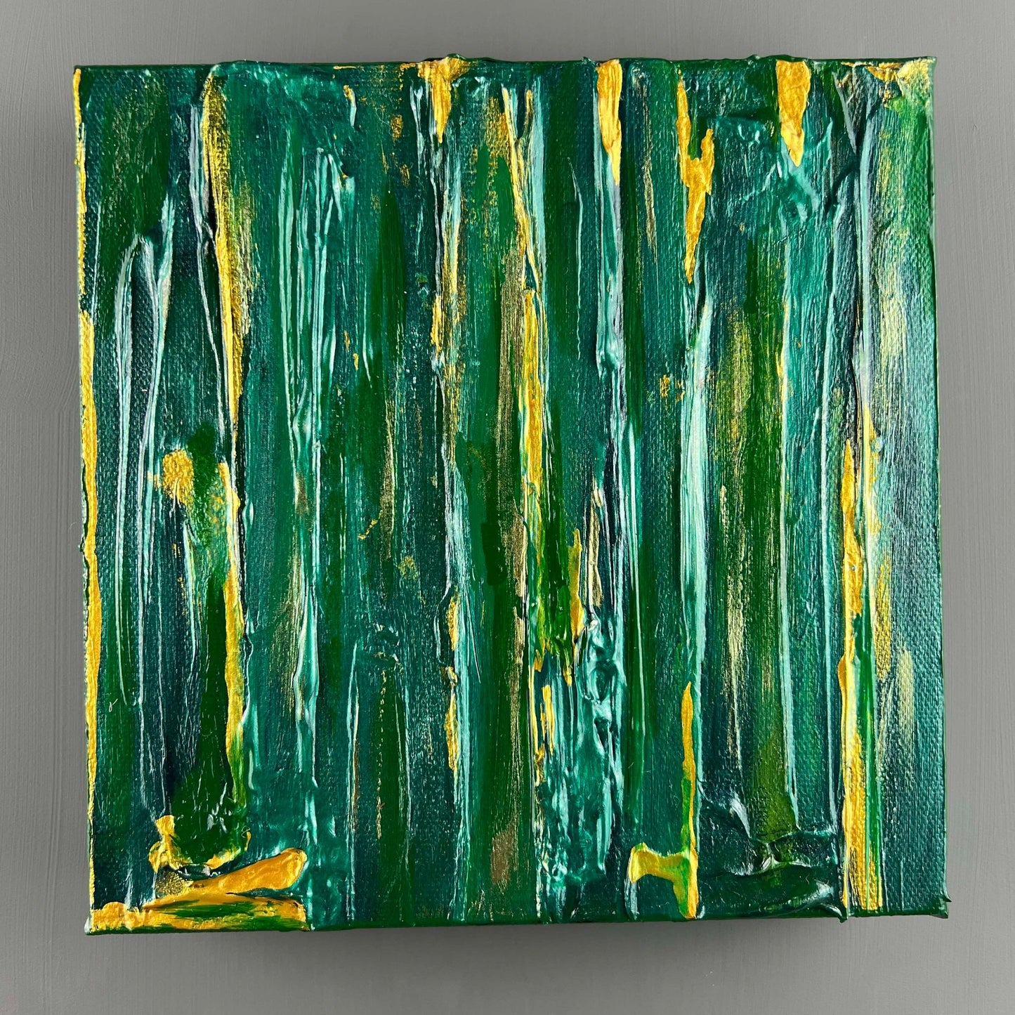 vivi & vela gemstone collection 'emerald' artwork in rich green tones.