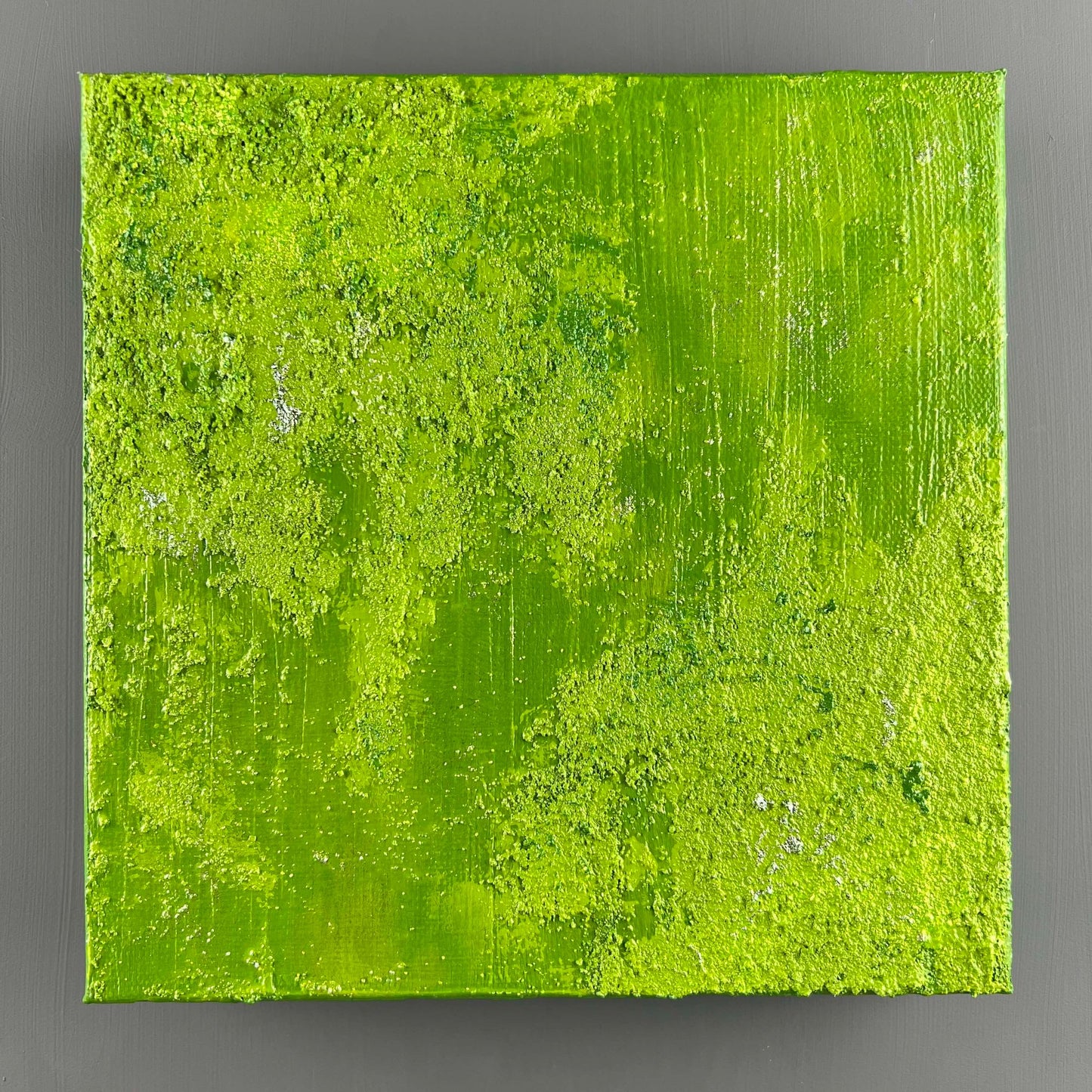 vivi & vela gemstone collection 'peridot' artwork in vibrant lime green hues.