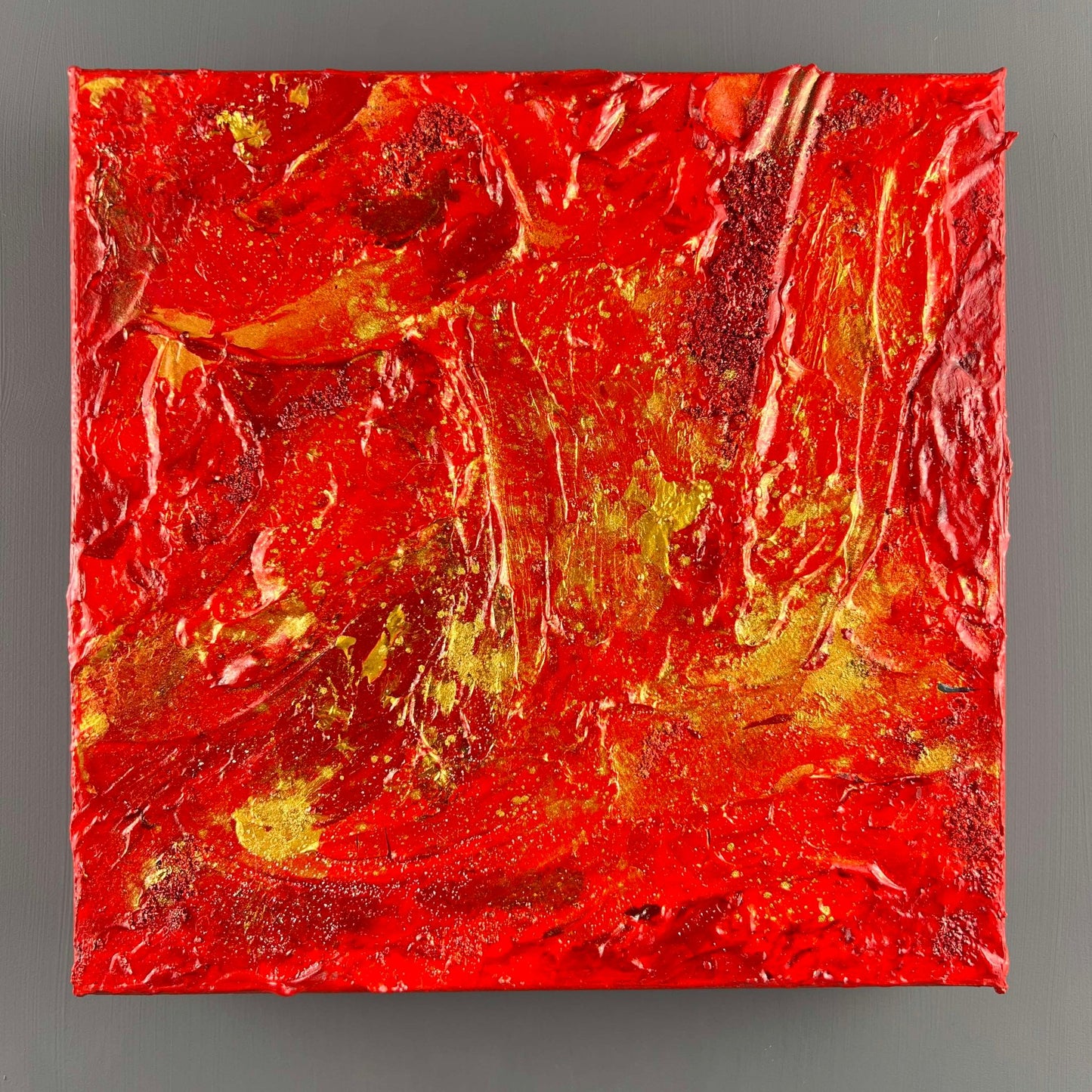 vivi & vela gemstone collection 'ruby' artwork in vibrant red tones.