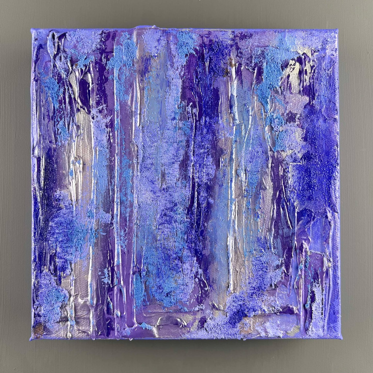 vivi & vela gemstone collection 'tanzanite' artwork in luminous blue-violet tones.