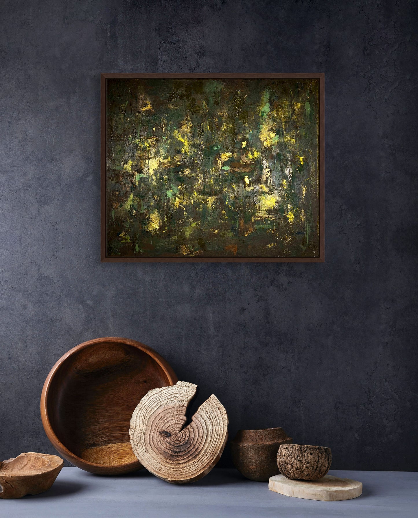 vivi & vela artwork display for 'enchanted forest': abstract artwork in a modern interior, showcasing its earthy tones and luxurious gold accents.