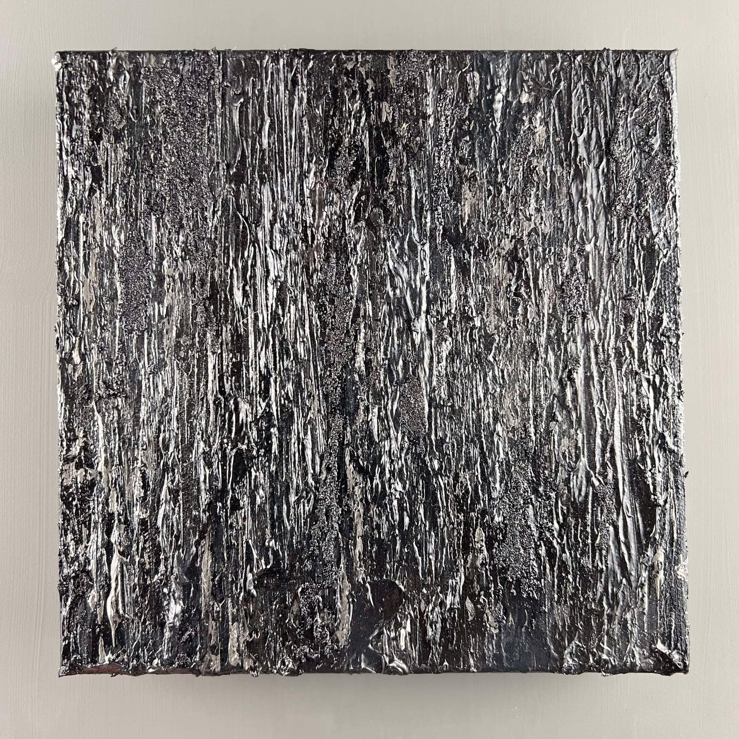 vivi & vela gemstone collection 'onyx' artwork with dramatic black and gray strokes.