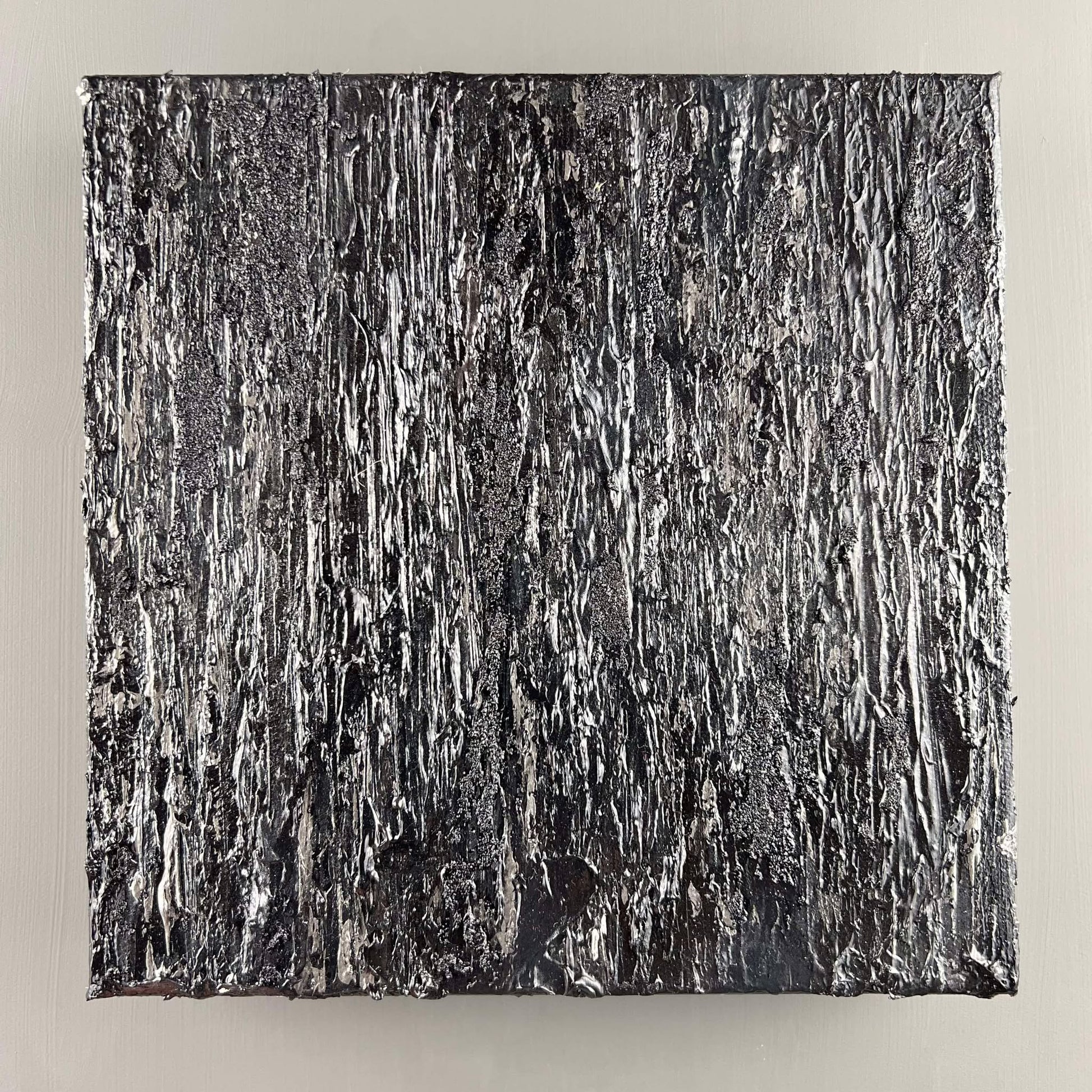 vivi & vela gemstone collection 'onyx' artwork with dramatic black and gray strokes.